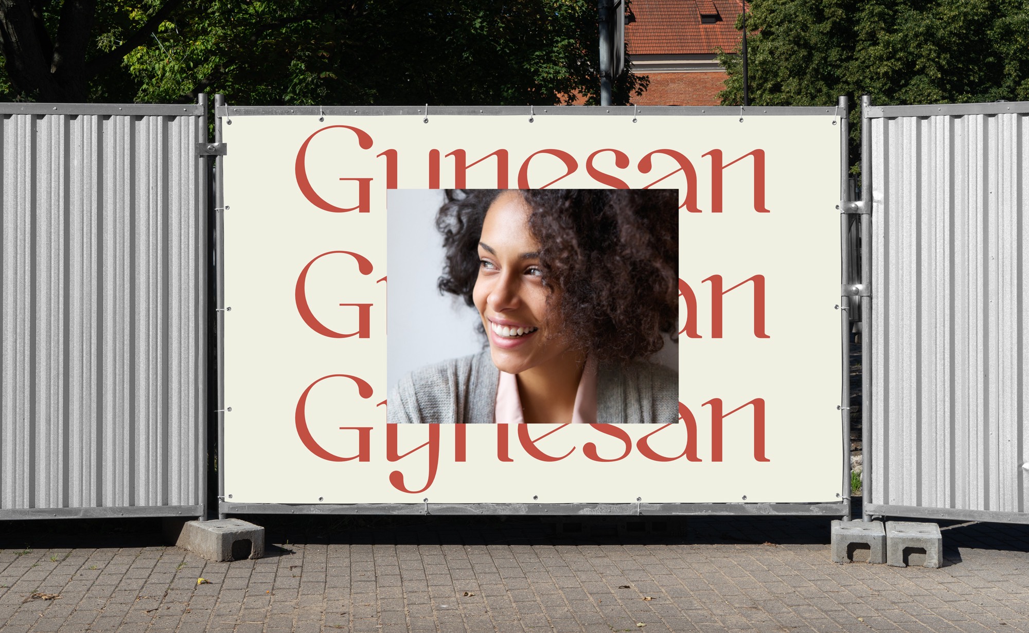 Diseño y desarrollo de identidad visual corporativa para Gynesan. Detalle lona publicitaria.