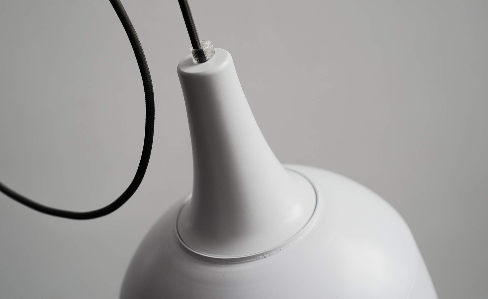 Diseño y desarrollo de identidad visual corporativa para Class Lighting. Detalle lámpara Cap.