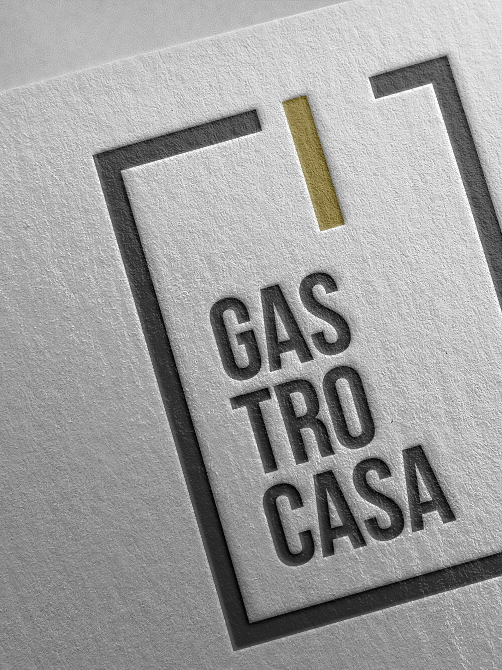 Diseño y desarrollo de identidad visual corporativa para Gastrocasa. Detalle logotipo golpe seco.