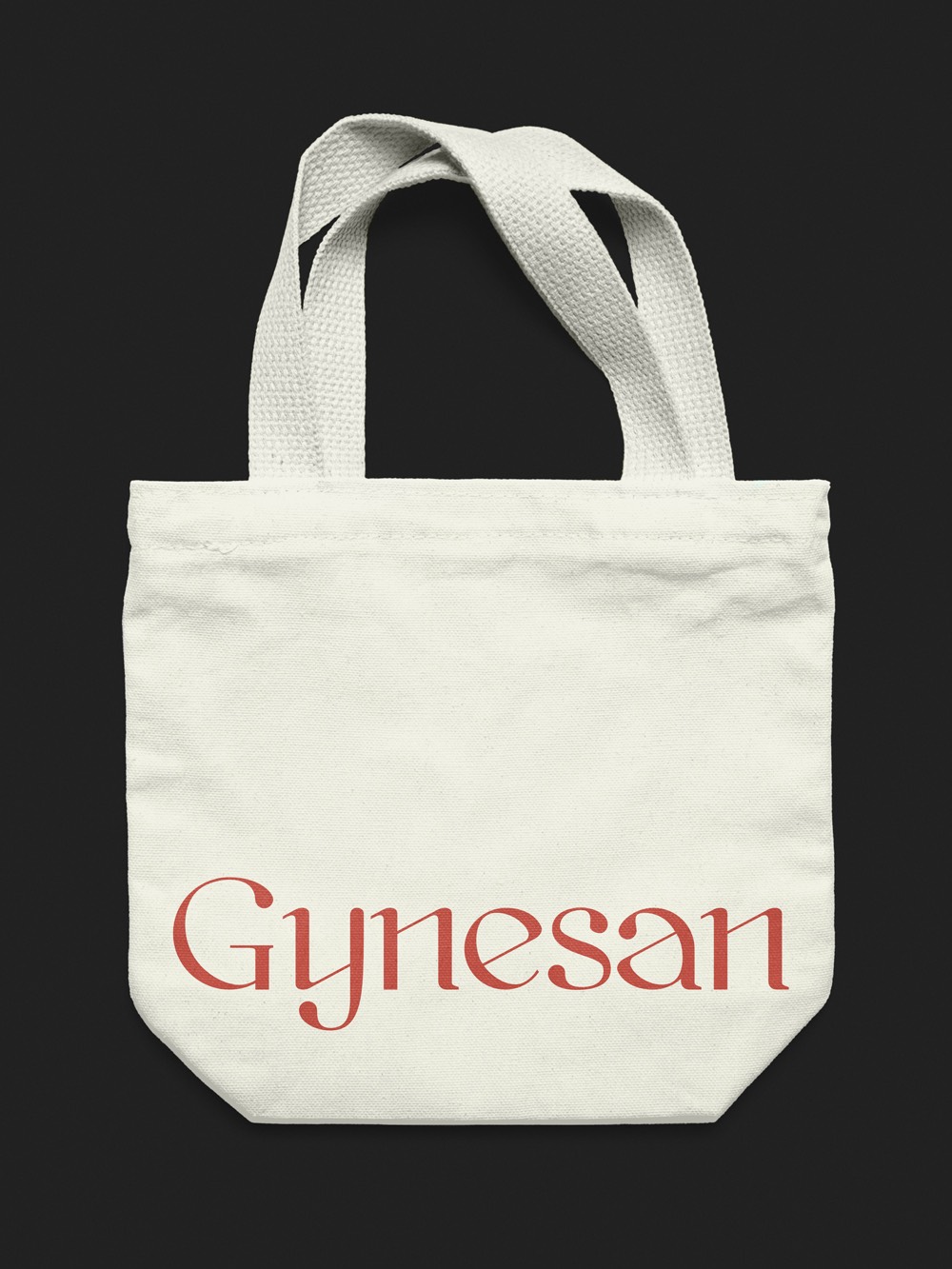 Diseño y desarrollo de identidad visual corporativa para Gynesan. Diseño de tote-bag.